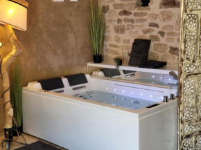 Cottage chaleureux avec jacuzzi et terrasse privée